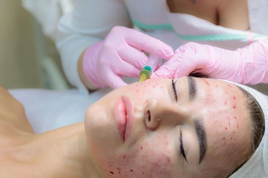 doctor-gives-injections-blood-plasma-into-face-young-girl_1089554-1429