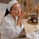 medium-shot-woman-using-face-mask_23-2150467061