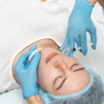 close-up-woman-lip-filler-procedure_23-2149315545