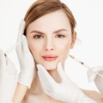 cosmetologists-hands-making-medical-botox-injections-beautiful-blonde-skin-lifting-facial-treatment-beauty-spa_176420-9347