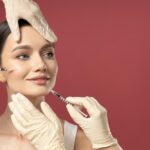 doctor-injects-botox-young-girl_185193-153645